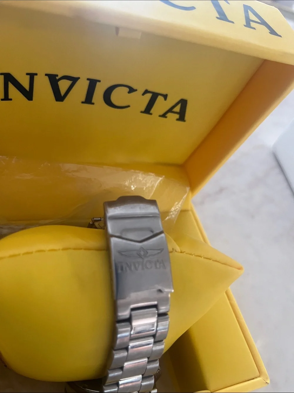 Invicta Silver Stainless Steel Watch with Blue Dial and Bezel